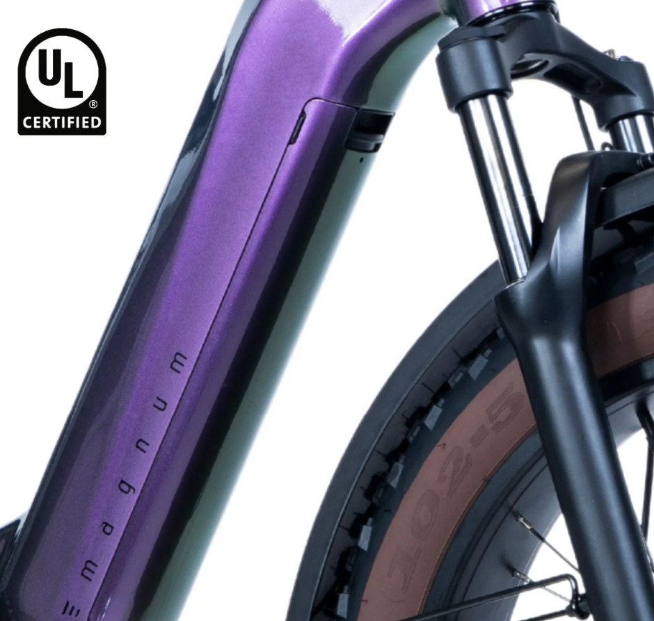 Magnum Bliss e-bike motor and fat tire detail Magnum Bliss e-bike motor and fat tire detail