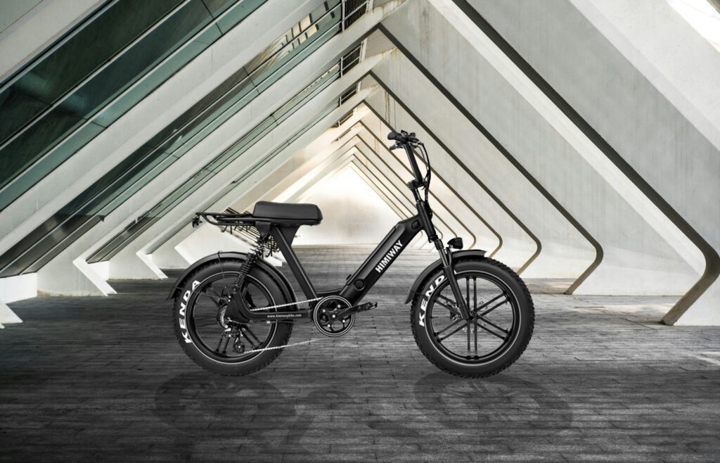black and gray bicycle on gray concrete floor black and gray bicycle on gray concrete floor