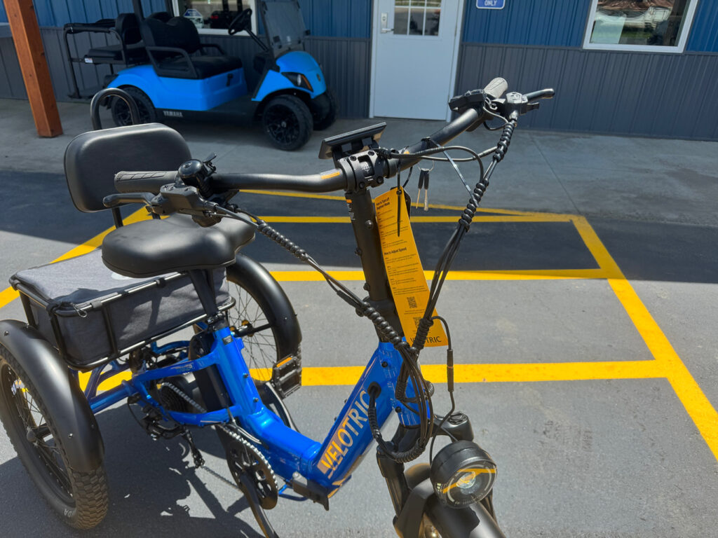 Velotric Triker safety features including hydraulic brakes and bright lights Velotric Triker safety features including hydraulic brakes and bright lights
