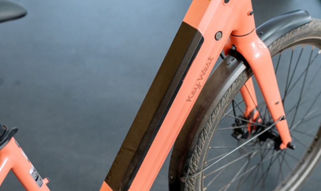 Person riding Key West Ebike on a beach path