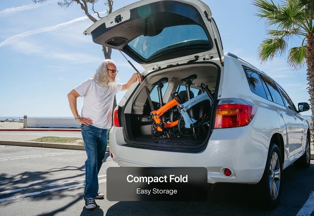 Folded Urtopia Carbon Fold 2 in a hatchback cargo area, manufacturer storage demonstration Folded Urtopia Carbon Fold 2 in a hatchback cargo area, manufacturer storage demonstration