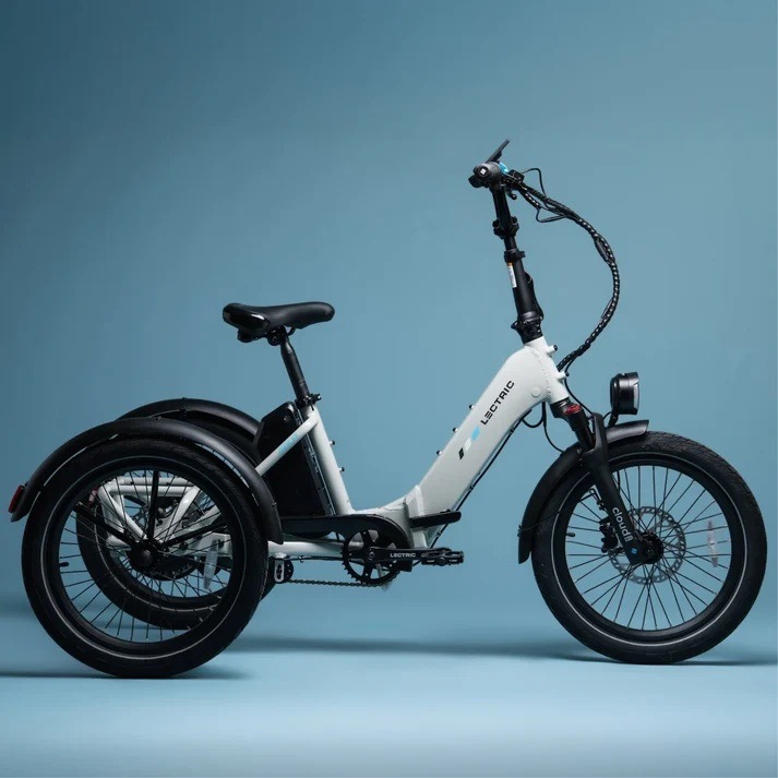 Lectric XP Trike2 in Stratus White, complete side view against a blue studio background