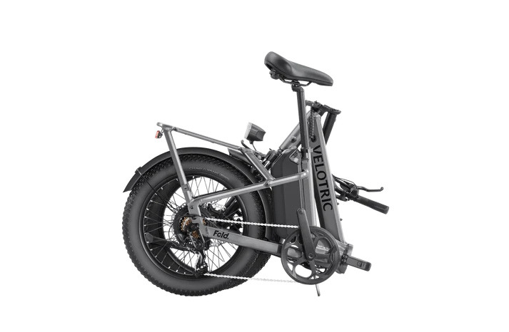 Velotric Fold 1 in Stone Gray with the frame and handlebar folded Velotric Fold 1 in Stone Gray with the frame and handlebar folded