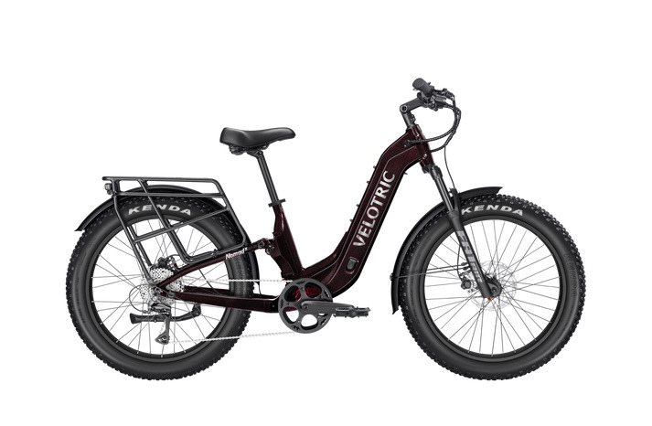 Velotric Nomad 2X in Fig, step-through full side view showing rear air suspension Velotric Nomad 2X in Fig, step-through full side view showing rear air suspension
